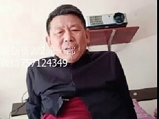 Knappe Chinese kostuumman